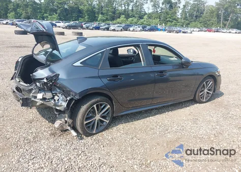 2023 Honda Civic Touring z USA, uszkodzony, nr VIN 2HGFE1F97PH323864